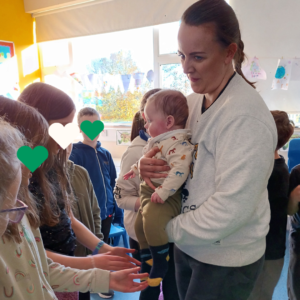 Hello baby song the children sing each time baby visits the classroom.